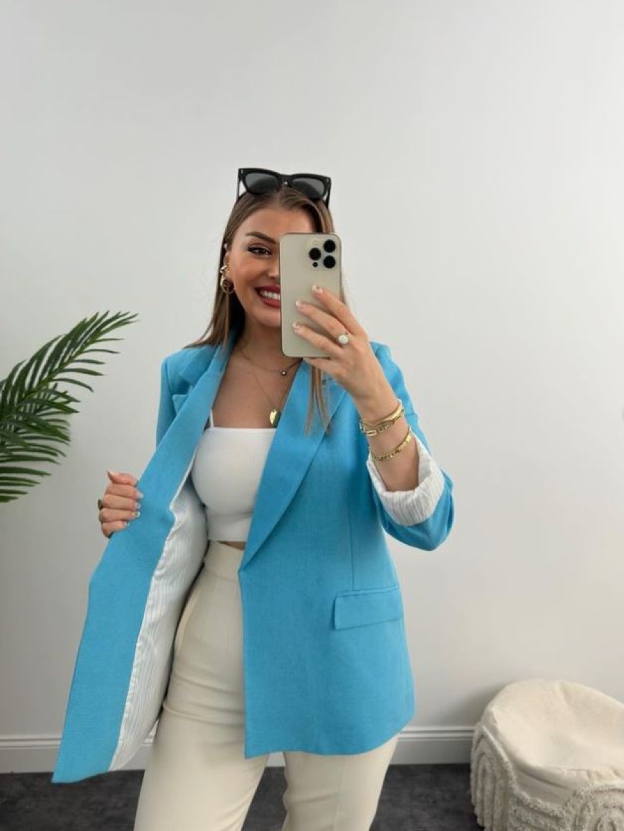 BLAZER BLEU AVEC REVERS AUX POIGNETS A RAYEURS